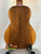 Wooden acoustic guitar in rich brown finish, showcasing KoAloha KCM-10 Concert Ukulele