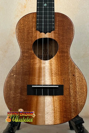 Wooden ukulele with natural finish and black fretboard, KoAloha KCM-10RP Royal Pikake