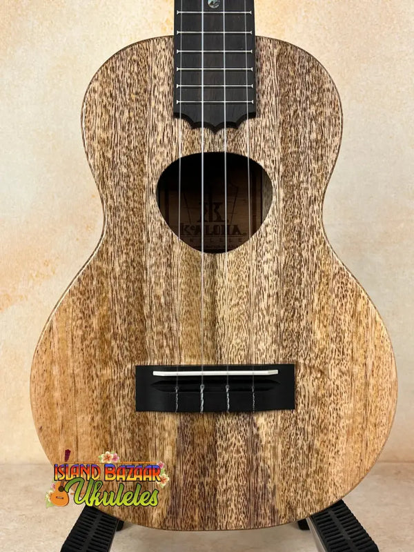 Wooden ukulele with unique grain and black hardware, KoAloha KCM-10RP-MG Concert model