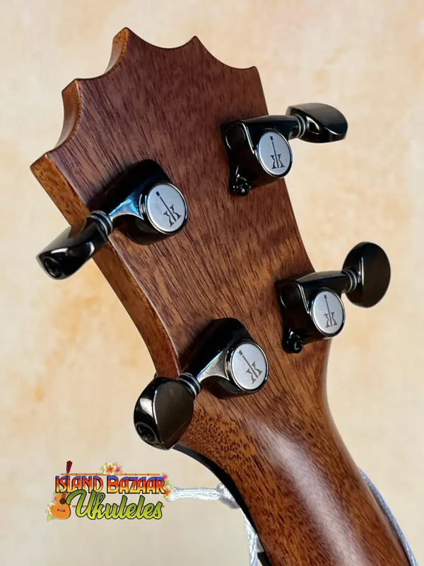 Guitar headstock with black tuning pegs on solid mango wood for KoAloha KCM-10RP-MG Concert