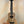 Wooden ukulele with dark fretboard and black tuning pegs, KoAloha KCM-10RP-MG Concert in solid mango wood