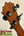 Guitar headstock with black tuning pegs and brown wood grain for KoAloha KSM-00 Soprano Ukulele