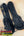 Black hardshell guitar case with plush lining for KoAloha KSM-00 featured soprano ukulele