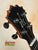 Guitar headstock with black tuning pegs and inlay for KoAloha KSM-00 Featured Soprano Ukulele