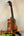 Wooden KoAloha KSM-00 Featured Soprano Ukulele with solid Hawaiian Koa on black stand