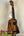 Wooden KoAloha KSM-00 Soprano Ukulele with Hawaiian Koa and Ebony Fretboard on stand