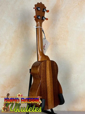 Wooden KoAloha KSM-00 Soprano Ukulele in Hawaiian Koa with ebony fretboard and grain patterns