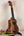 Wooden KoAloha KSM-10 Soprano Ukulele with dark grain and Pikake Satin Finish on stand