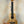 Wooden KoAloha KTM-00 MG Mango Tenor Ukulele showcasing solid mango wood grain patterns