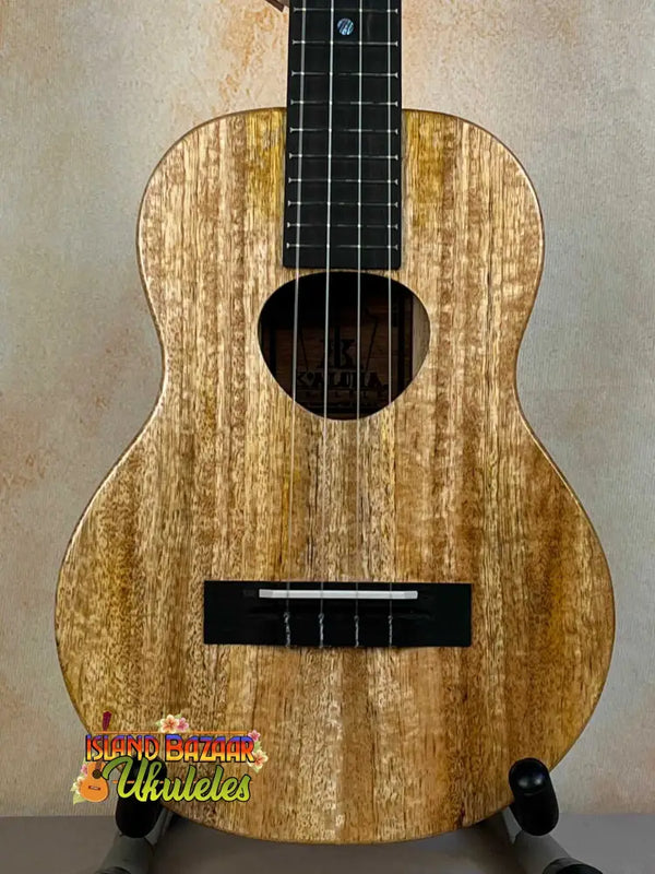 KoAloha KTM-00 MG Mango Tenor Ukulele with natural wood grain and ebony fretboard