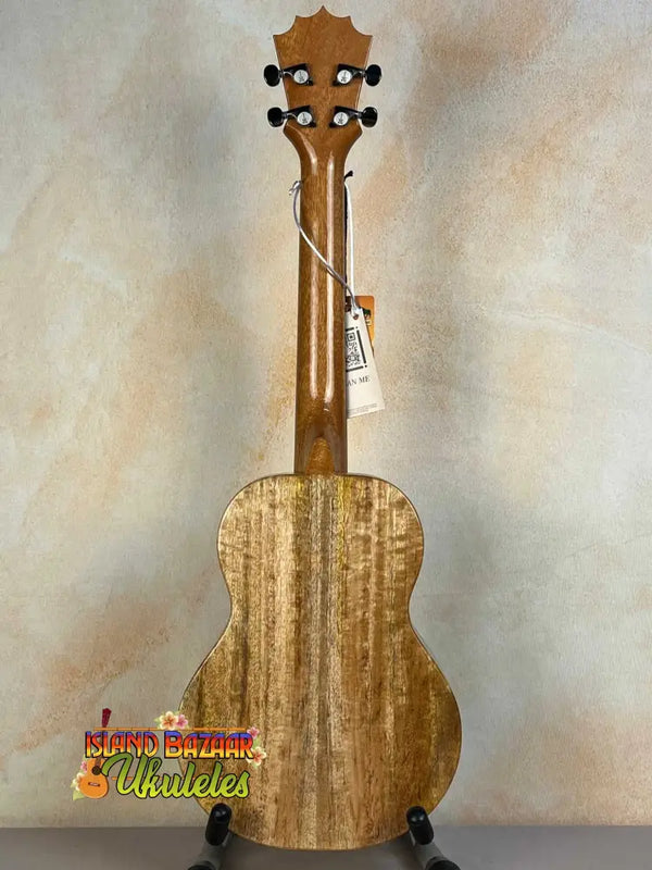 Wooden KoAloha KTM-00 MG Mango Tenor Ukulele displaying solid mango wood grain patterns