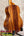 A koaloha ktm-00 tenor ukulele with glossy hawaiian koa zebra wood grain delivering authentic hawaiian sound