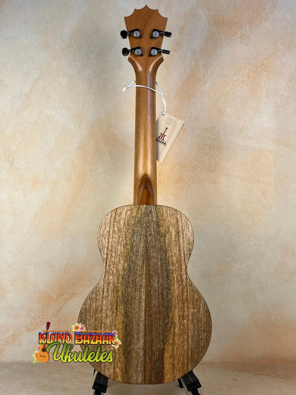 Wooden KoAloha KTM-10RP-MG Tenor Mango Ukulele with natural grain and dark headstock