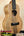 Wooden KoAloha KTM-10RP-MG Tenor Mango Ukulele showcasing natural grain patterns