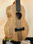 Wooden KoAloha KTM-10RP-MG Tenor Mango Ukulele showcasing natural grain patterns