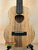 Wooden KoAloha KTM-10RP-MG Tenor Mango Ukulele with natural grain and black fretboard