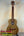Wooden ukulele with natural grain, KoAloha KTO-10 Opio Tenor and dark fretboard