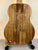 KoAloha KTO-10 Opio Tenor Ukulele with striped wood grain pattern on a black stand