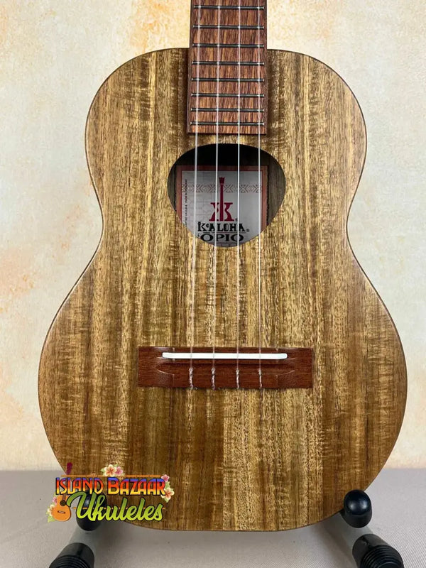 Wooden KoAloha KTO-10 Opio Tenor Ukulele with natural grain finish and dark fretboard