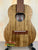 Wooden KoAloha KTO-10 Opio Tenor Ukulele with natural grain finish and dark fretboard