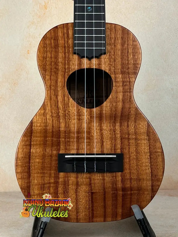 Beautiful Koa wood Ukulele with dark grain patterns, KoAloha Royal Pikake KCM-00RP