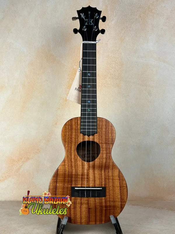 KoAloha Royal Pikake Concert Ukulele KCM-00RP with Koa wood body and black fretboard