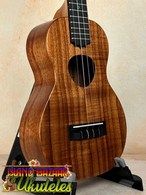 Beautiful Koa wood Ukulele with dark grain patterns from KoAloha Royal Pikake KCM-00RP