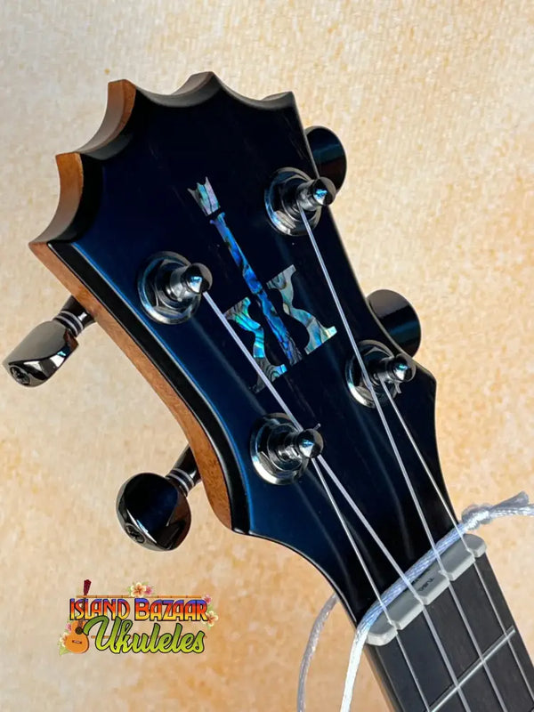 Guitar headstock with blue inlay and black pegs for KoAloha Royal Pikake KCM-00RP