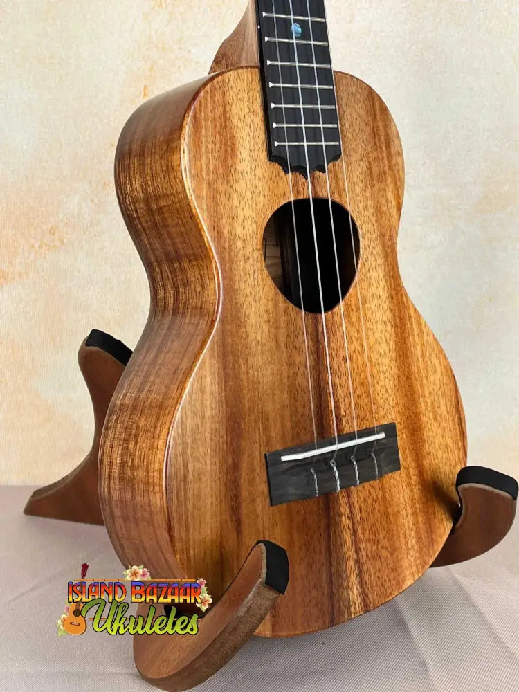 Beautiful KoAloha Royal Pikake Concert Ukulele with rich koa grain and dark fretboard