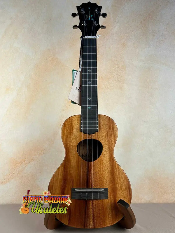 Wooden KoAloha Royal Pikake Concert Ukulele with heart-shaped sound hole features