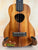 Wooden ukulele with koa finish and black fretboard, perfect for the KoAloha Royal Pikake Concert