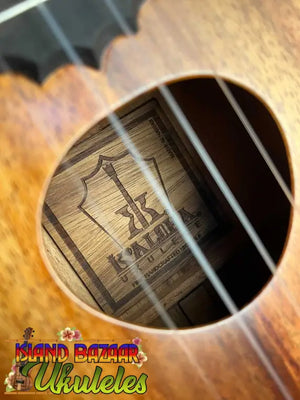 KoAloha Royal Pikake Concert Ukulele Koa Satin-Finish with visible label in sound hole