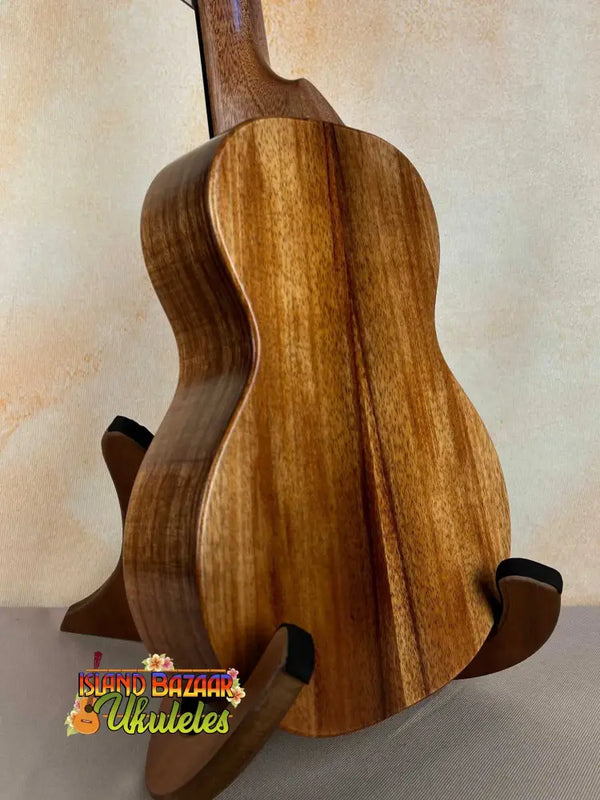 Wooden ukulele showcasing rich koa wood grain in KoAloha Royal Pikake Concert model