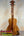 Wooden ukulele with natural finish and dark pegs from KoAloha Royal Pikake Concert