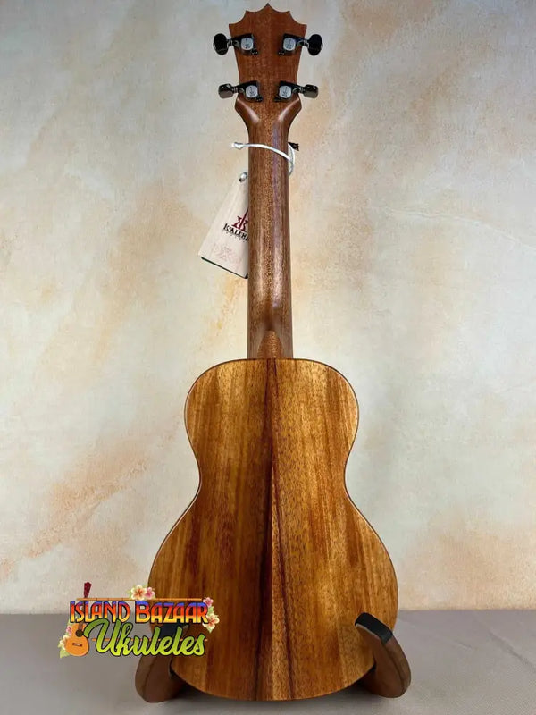 Wooden ukulele with natural finish and dark pegs from KoAloha Royal Pikake Concert