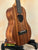 Wooden ukulele on stand, Koaloha Royal Pikake Tenor Uke with solid Hawaiian koa