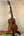 Brown wooden ukulele from Koaloha Royal Pikake series, royal pikake tenor, solid Hawaiian koa