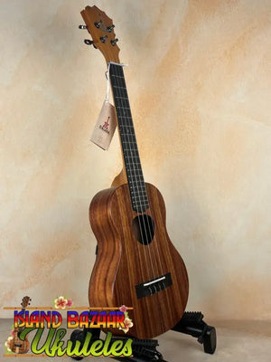 Brown wooden ukulele from Koaloha Royal Pikake series, royal pikake tenor, solid Hawaiian koa