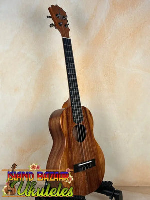 Wooden ukulele with dark grain patterns from the Koaloha Royal Pikake Tenor KTM-10RP
