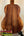 Wooden acoustic guitar with rich brown grain patterns, showcasing Koaloha Royal Pikake