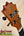 Wooden guitar headstock of Koaloha Royal Pikake Tenor Ukulele with black tuning pegs