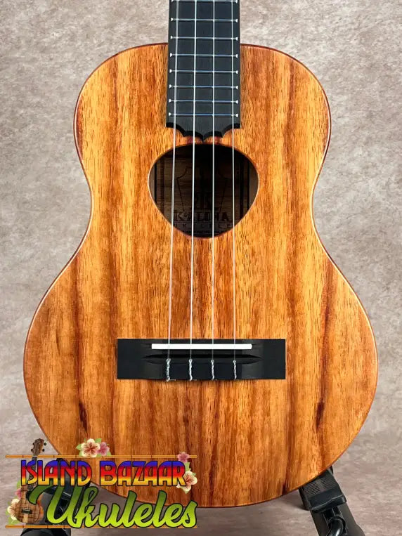 Light brown Koaloha Tenor ukulele with matte finish showcasing Hawaiian ukulele craftsmanship