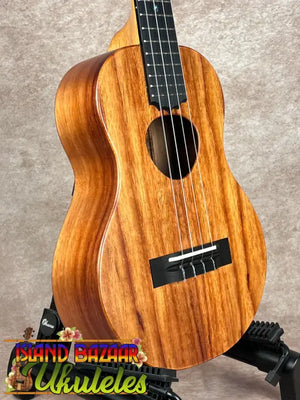 Koaloha tenor matte finish Hawaiian ukulele with dark fretboard and four white strings