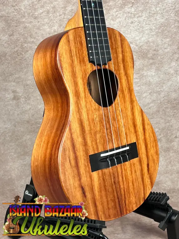 Koaloha tenor matte finish Hawaiian ukulele with dark fretboard and four white strings