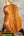 Wooden Koaloha Tenor Ukulele with prominent grain pattern and matte finish showcasing Hawaiian craftsmanship