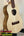 Light-colored wooden ukulele with natural finish, KoAloha Tenor Opio KTO-10S Solid Acacia