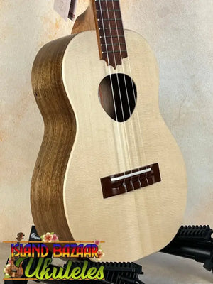 Light-colored wooden ukulele with natural finish, KoAloha Tenor Opio KTO-10S Solid Acacia