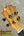 Headstock of Koaloha Royal Pikake tenor ukulele with mother-of-pearl inlay and chrome tuners