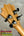 Back of Koaloha Royal Pikake Tenor ukulele headstock with four black tuning pegs in matte finish