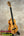 Wooden ukulele with black fretboard and tuning pegs from Koaloha Royal Pikake tenor line